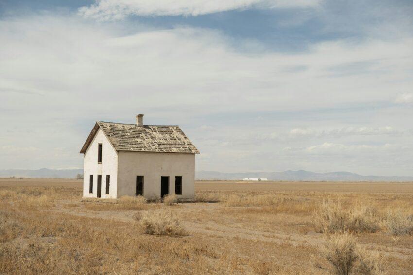 an old abandoned house in the middle of nowhere