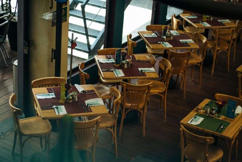brown wooden table with chairs